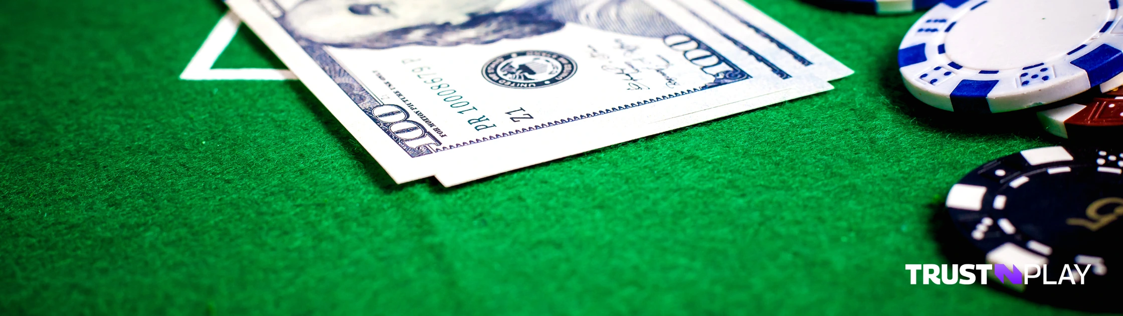 Bets and chips at a casino table.